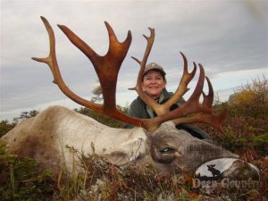 Debbie Cunningham - Woodland Caribou with Deep Country Lodge